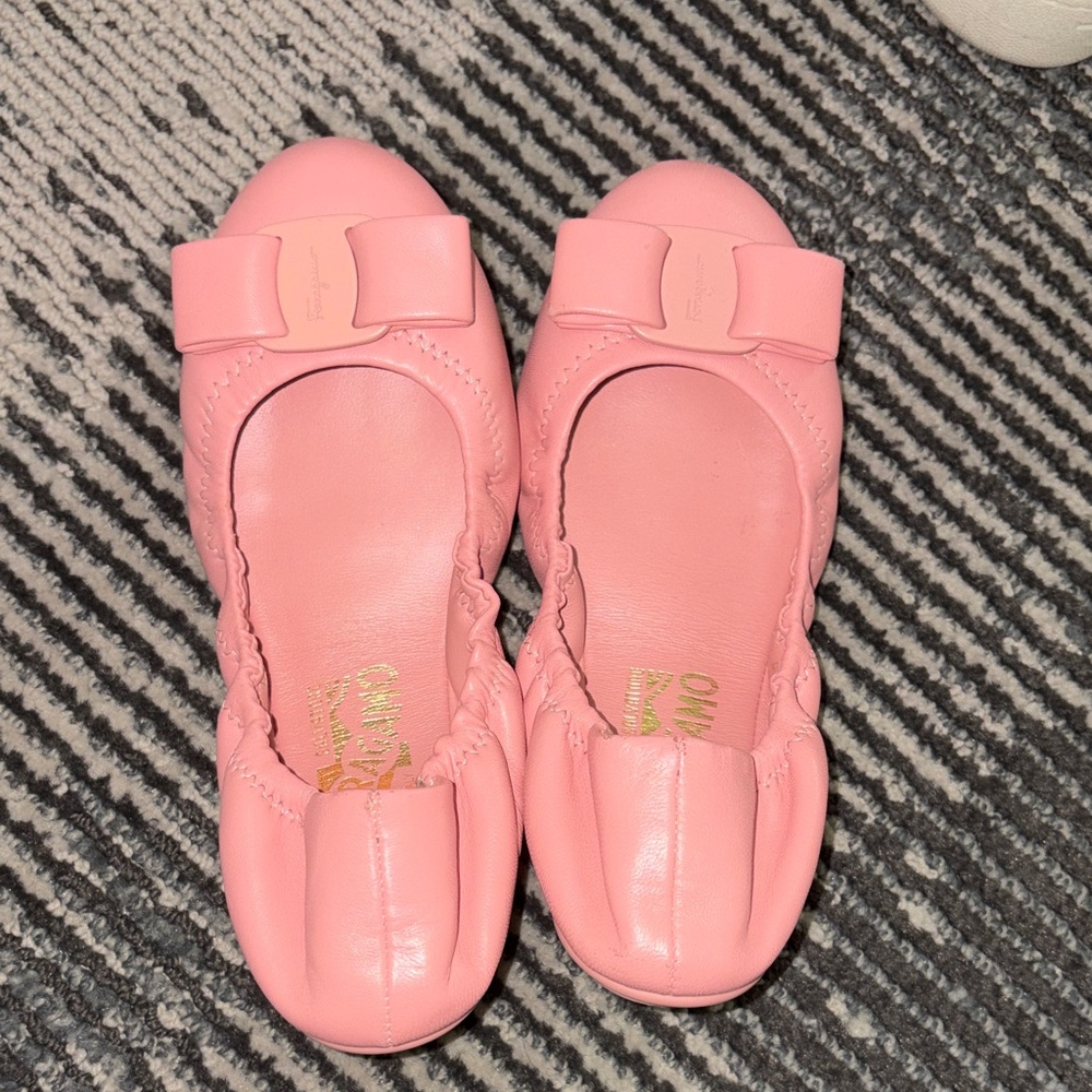 Pink Ferragamo flats